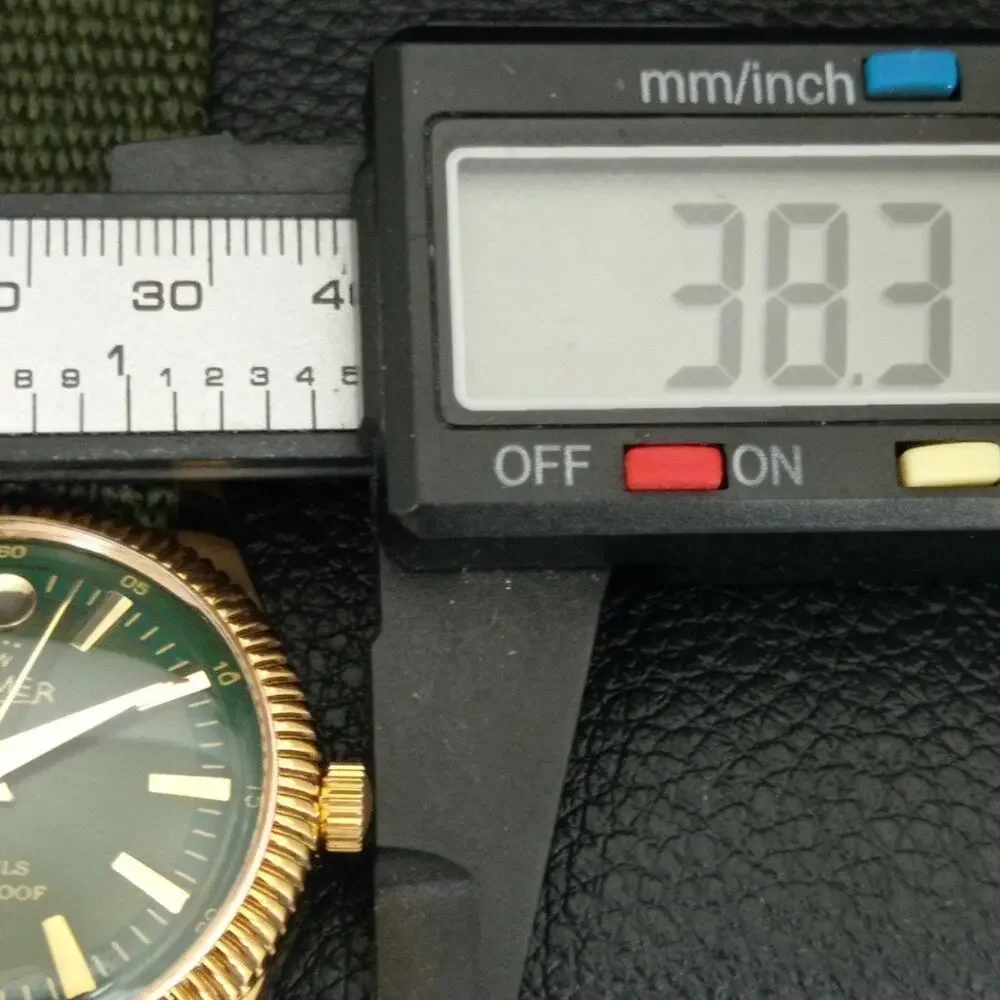 Vintage 1985 Roamer Manual Mens Gold Watch W/Nato Strap & Green accents